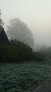 Preview wallpaper road, country, fog, trees, haze, house, gloomy