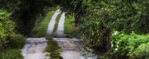 Preview wallpaper road, country, strips, vegetation, summer, cloudy