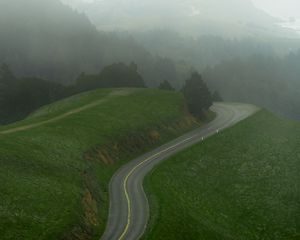 Preview wallpaper road, curve, grass, trees, hills, nature