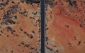 Preview wallpaper road, desert, aerial view, sand, stones
