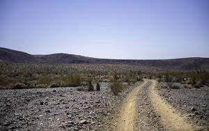 Preview wallpaper road, desert, bushes, hills