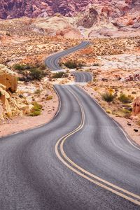 Preview wallpaper road, desert, rocks, asphalt, winding