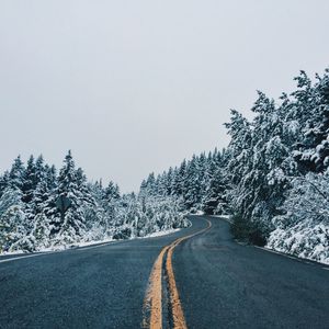 Preview wallpaper road, distance, winding, trees, snow, snowy