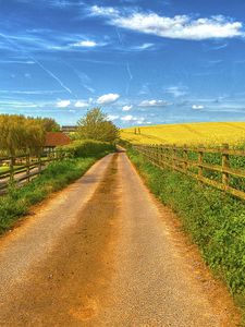 Preview wallpaper road, field, fence, house, landscape