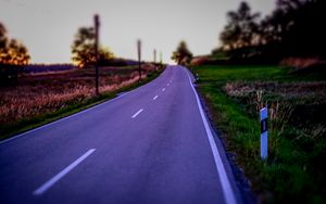 Preview wallpaper road, field, trees, blur