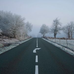 Preview wallpaper road, fog, asphalt, arrow, frost, marking