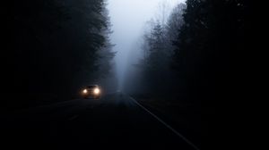 Preview wallpaper road, fog, dark, trees, car