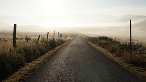 Preview wallpaper road, fog, desert, grass