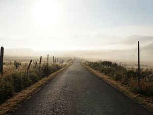 Preview wallpaper road, fog, desert, grass