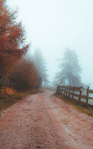 Preview wallpaper road, fog, distance, fence