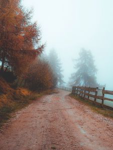 Preview wallpaper road, fog, distance, fence