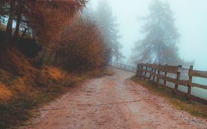 Preview wallpaper road, fog, distance, fence