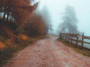 Preview wallpaper road, fog, distance, fence