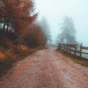 Preview wallpaper road, fog, distance, fence