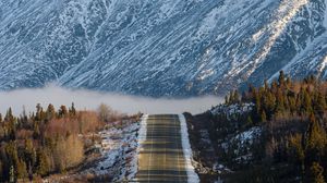 Preview wallpaper road, fog, mountains, snow, snowy
