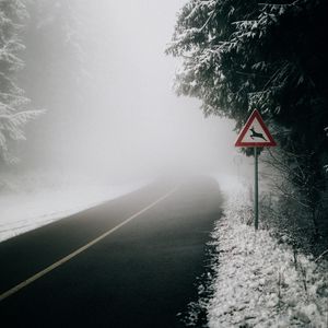 Preview wallpaper road, fog, sign, asphalt, branches