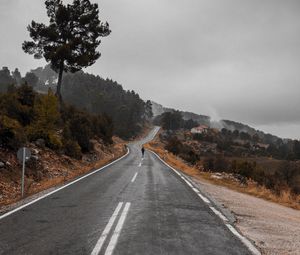 Preview wallpaper road, fog, silhouette, loneliness, tree