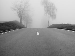 Preview wallpaper road, fog, trees, bw, hills