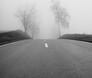 Preview wallpaper road, fog, trees, bw, hills