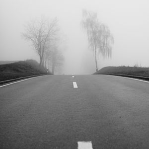 Preview wallpaper road, fog, trees, bw, hills