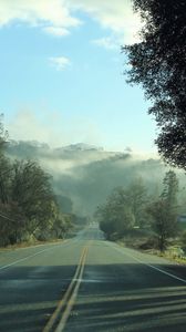 Preview wallpaper road, fog, trees, mountains, morning, landscape