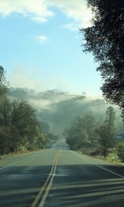 Preview wallpaper road, fog, trees, mountains, morning, landscape