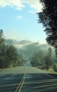 Preview wallpaper road, fog, trees, mountains, morning, landscape