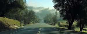 Preview wallpaper road, fog, trees, mountains, morning, landscape