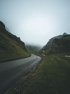 Preview wallpaper road, fog, turn, mountains