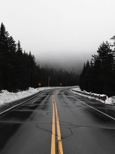 Preview wallpaper road, fog, turn, snow, overcast
