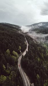 Preview wallpaper road, forest, aerial view, mountains, hills