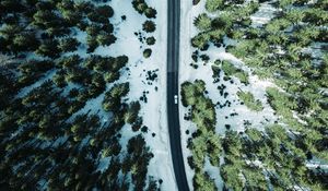 Preview wallpaper road, forest, snow, trees, aerial view