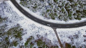 Preview wallpaper road, forest, snow, car, aerial view