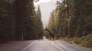 Preview wallpaper road, forest, trees, building, nature