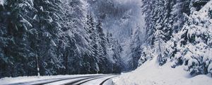 Preview wallpaper road, forest, turn, mountains, snowy, winter, trees