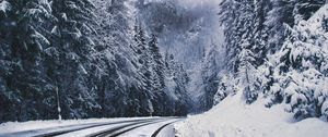 Preview wallpaper road, forest, turn, mountains, snowy, winter, trees