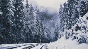 Preview wallpaper road, forest, turn, mountains, snowy, winter, trees