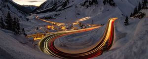 Preview wallpaper road, freezelight, mountains, houses, snow, night