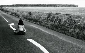 Preview wallpaper road, girl, pose, asphalt, field, bw