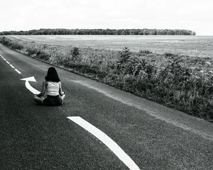 Preview wallpaper road, girl, pose, asphalt, field, bw