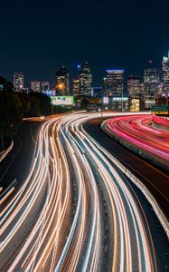 Preview wallpaper road, glow, buildings, long exposure, city, night