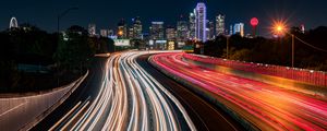 Preview wallpaper road, glow, buildings, long exposure, city, night