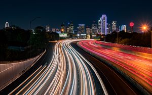 Preview wallpaper road, glow, buildings, long exposure, city, night