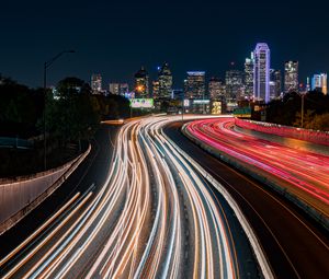 Preview wallpaper road, glow, buildings, long exposure, city, night