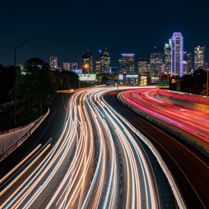 Preview wallpaper road, glow, buildings, long exposure, city, night