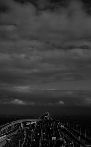 Preview wallpaper road, highway, bw, sky, clouds, dark