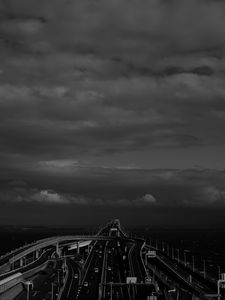 Preview wallpaper road, highway, bw, sky, clouds, dark