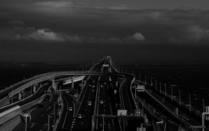 Preview wallpaper road, highway, bw, sky, clouds, dark