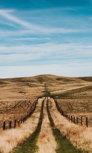 Preview wallpaper road, hills, fields, fence, landscape