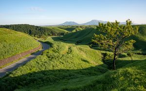 Preview wallpaper road, hills, grass, landscape